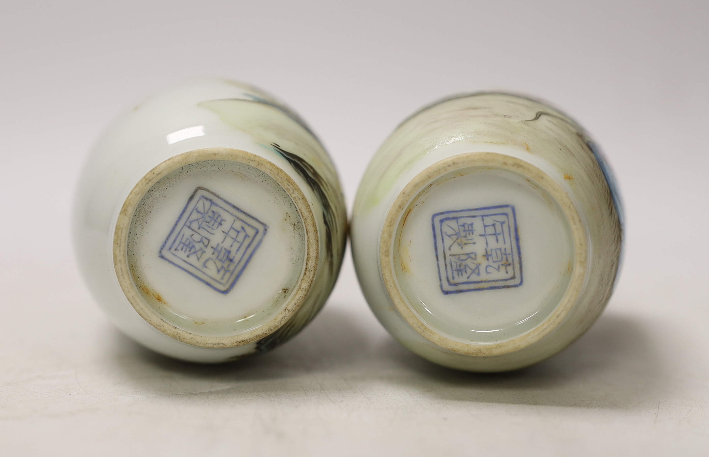 A pair of small Chinese famille verte vases, Qianlong marks but Republic period, depicting Lu Dongbin and Li Tieguai, 13cm